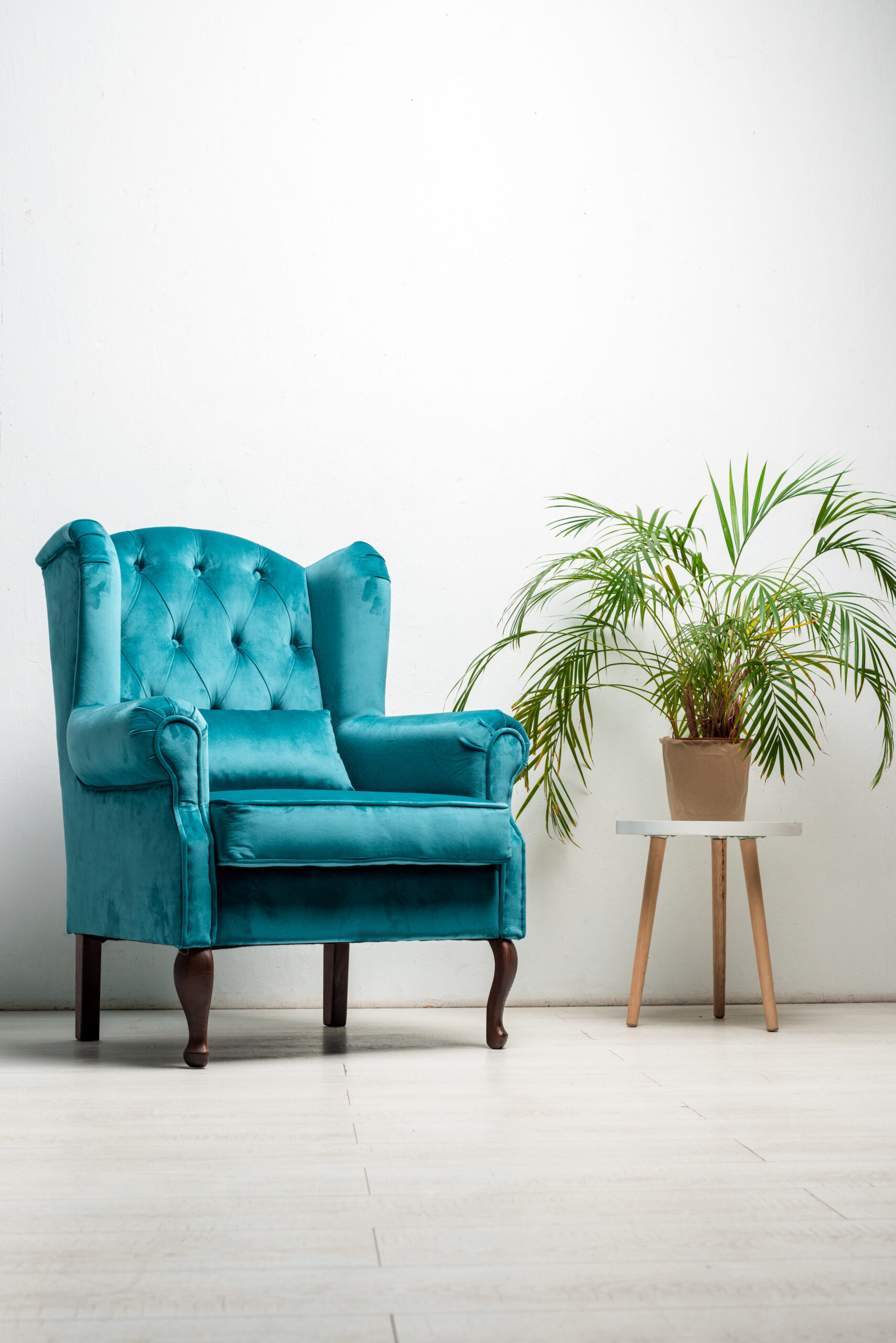elegant velour blue armchair with pillow